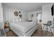 Comfortable bedroom featuring a queen bed, neutral decor, and ample space for a relaxing retreat at 2001 S Ocean Blvd. # 1405, Myrtle Beach, SC 29577