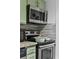 Close up view of modern kitchen with stainless steel appliances, stylish backsplash, and functional design at 2001 S Ocean Blvd. # 1405, Myrtle Beach, SC 29577