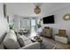 Bright living room with a coastal aesthetic and balcony access offering ocean views at 2001 S Ocean Blvd. # 1405, Myrtle Beach, SC 29577