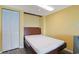 Small bedroom with a bed and closet at 2007 S Ocean Blvd. # 1403, Myrtle Beach, SC 29577