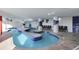 Indoor lazy river with decorative columns offers a tranquil and enjoyable experience at 2007 S Ocean Blvd. # 1403, Myrtle Beach, SC 29577