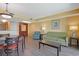 Relaxing living room with comfortable seating, bright walls, and a dining area, creating a welcoming space for guests at 2007 S Ocean Blvd. # 1403, Myrtle Beach, SC 29577