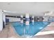 Indoor pool with columns and lifeguard information provides a safe and relaxing environment at 2007 S Ocean Blvd. # 1403, Myrtle Beach, SC 29577