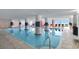 Indoor pool with columns and views of the ocean provides a relaxing atmosphere at 2007 S Ocean Blvd. # 1403, Myrtle Beach, SC 29577