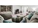 Cozy living room with comfortable seating, a large TV, and stylish decor, great for relaxing at 215 Kendrick St., Little River, SC 29566