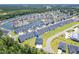 Aerial view showcasing the neighborhood, ponds, landscaping, and the home's location at 215 Vivian St. Nw # 215, Calabash, NC 28467