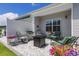 Backyard patio featuring outdoor seating and a grill for entertaining at 215 Vivian St. Nw # 215, Calabash, NC 28467