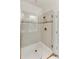 Modern shower features sleek tiling, glass doors, and updated fixtures for a luxurious bathing experience at 215 Vivian St. Nw # 215, Calabash, NC 28467