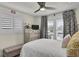 Cozy bedroom featuring stylish furnishings, a dresser, and bright windows with shades and curtains at 25 Newport St., Ocean Isle Beach, NC 28469