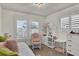 Adorable bedroom with a cozy daybed, chair, and desk creating a charming and functional space at 25 Newport St., Ocean Isle Beach, NC 28469