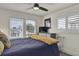 Inviting bedroom showcasing a comfortable bed, stylish furnishings, and a bright window with views at 25 Newport St., Ocean Isle Beach, NC 28469