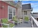 Relaxing outdoor deck with comfortable seating, perfect for enjoying the views and fresh air in a peaceful setting at 25 Newport St., Ocean Isle Beach, NC 28469