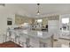 Cozy kitchen featuring a breakfast bar with barstool seating and classic appliances at 25 Newport St., Ocean Isle Beach, NC 28469