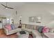 Comfortable sectional sofa with patterned pillows in a bright living room with hardwood floors at 25 Newport St., Ocean Isle Beach, NC 28469