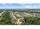 Expansive aerial view of a residential community nestled amidst lush greenery and serene ponds at 2709 Eton St., Myrtle Beach, SC 29579
