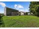 Expansive backyard with lush green grass, mature trees, and well-defined property lines at 2709 Eton St., Myrtle Beach, SC 29579
