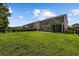 Lush backyard featuring a well-maintained lawn, privacy fence, and patio at 2709 Eton St., Myrtle Beach, SC 29579