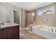 Relaxing bathroom with a soaking tub, walk-in shower, and neutral tones at 2709 Eton St., Myrtle Beach, SC 29579