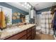Stylish bathroom with dual sinks, granite countertops, and decorative accents at 2709 Eton St., Myrtle Beach, SC 29579