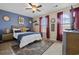 Cozy bedroom featuring a comfortable bed, natural light, and stylish decor at 2709 Eton St., Myrtle Beach, SC 29579