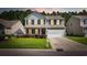 Charming two-story home boasts a well-manicured lawn, complemented by a two-car garage and inviting front porch at 2709 Eton St., Myrtle Beach, SC 29579