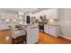 Modern kitchen with stainless appliances, granite counters and white cabinets at 2709 Eton St., Myrtle Beach, SC 29579