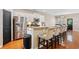 Stylish kitchen with stainless steel appliances, granite countertops, and comfortable bar seating at 2709 Eton St., Myrtle Beach, SC 29579