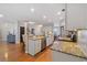 Well-lit, open-concept kitchen featuring stainless steel appliances and granite countertops at 2709 Eton St., Myrtle Beach, SC 29579