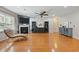 Bright living room features hardwood floors, ceiling fan, fireplace, and stylish furnishings at 2709 Eton St., Myrtle Beach, SC 29579
