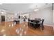 Open-concept living space connects the kitchen and dining areas with hardwood floors at 2709 Eton St., Myrtle Beach, SC 29579