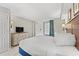 Cozy bedroom featuring a dresser with a television, complementing the decor and providing entertainment at 3000 N Ocean Blvd. # 420, Myrtle Beach, SC 29577