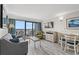 Living room featuring ocean view and a dining area at 3000 N Ocean Blvd. # 420, Myrtle Beach, SC 29577
