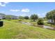 Backyard featuring a community pond with fountain providing a serene view and lush green space at 3017 Mercer Dr. # 0, Conway, SC 29526