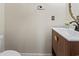 Powder room featuring a modern vanity with sleek fixtures and a decorative mirror at 3017 Mercer Dr. # 0, Conway, SC 29526