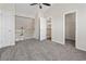 Upstairs bedroom with carpet flooring and two door entrances at 3017 Mercer Dr. # 0, Conway, SC 29526