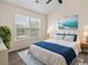 Bedroom with bright natural light, stylish decor, and a comfortable queen-sized bed at 3017 Mercer Dr. # 0, Conway, SC 29526