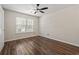 Cozy bedroom with vinyl floors and a large window at 3017 Mercer Dr. # 0, Conway, SC 29526