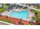 Aerial view of a community pool with lounge chairs and red mulch offering a relaxing outdoor space at 3017 Mercer Dr. # 0, Conway, SC 29526
