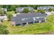 Aerial view of the back of townhomes showing the screened in porches overlooking well maintained lawns at 3017 Mercer Dr. # 0, Conway, SC 29526