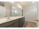 Bathroom featuring double sinks, a large mirror, and ample counter space at 3308 Little Bay Dr., Conway, SC 29526
