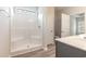 Bathroom with a stand-up shower, double doors, and a single sink at 3308 Little Bay Dr., Conway, SC 29526