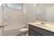 Bright bathroom features a shower and tub combination and a modern vanity with sleek fixtures at 3308 Little Bay Dr., Conway, SC 29526