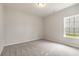 Bedroom showcasing a window view and neutral paint at 3308 Little Bay Dr., Conway, SC 29526