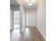 Hallway with contemporary flooring, neutral walls, and a front door leading to the entrance at 3308 Little Bay Dr., Conway, SC 29526