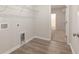 Laundry room with vinyl floors, wire rack shelving, and washer and dryer hookups at 3308 Little Bay Dr., Conway, SC 29526