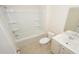 A modern bathroom features a shower-tub combination, tiled floors, and vanity sink at 3557 Ashridge Way, Conway, SC 29526