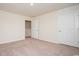 An additional bedroom featuring neutral walls, carpet, and closet with doors in view at 3557 Ashridge Way, Conway, SC 29526