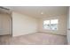 Spacious bedroom with neutral carpet and a view of the neighborhood at 3557 Ashridge Way, Conway, SC 29526