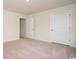 Bedroom with carpet, closet, and doorways at 3557 Ashridge Way, Conway, SC 29526