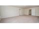 A bright, carpeted bonus room, featuring an open closet, and a bathroom en suite at 3557 Ashridge Way, Conway, SC 29526